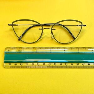 Silhouette Glasses Cat-Eye Frames in cool green.